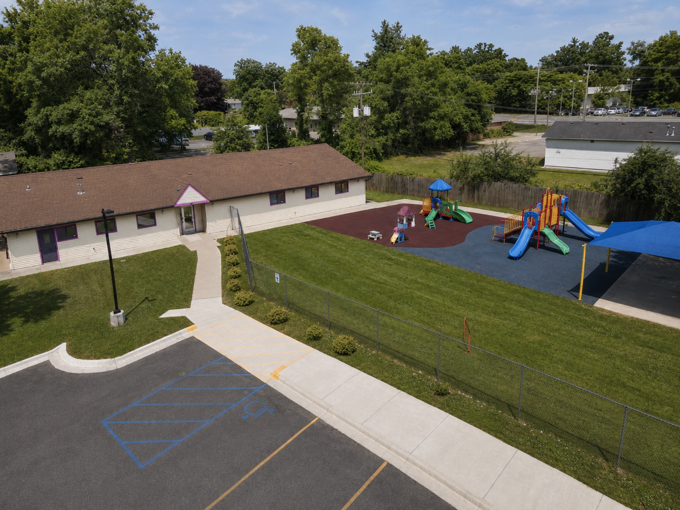 Aerial view of the VLC building and fenced playground